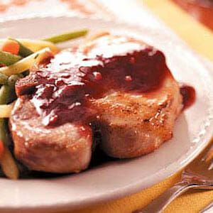 Pork Chops with Blackberry Sauce Recipe | Taste of Home Baked Meals, Pork Tenderloin Medallions, Blackberry Sauce, Pork Sauce, Apple Pork Chops, Cranberry Chutney, Pork Loin Chops, Raspberry Sauce, Frozen Cranberries