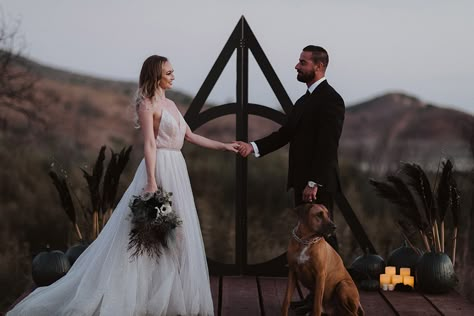 Gothic Harry Potter Wedding | Stitch & Tie | Stitch & Tie Harry Potter Elopement, Deathly Hallows Wedding Arch, Harry Potter Wedding Arch, Harry Potter Wedding Photos, Wedding Harry Potter Theme, Wedding Dress Harry Potter, Harry Potter Themed Wedding Dress, Slytherin Wedding Theme, Subtle Harry Potter Wedding