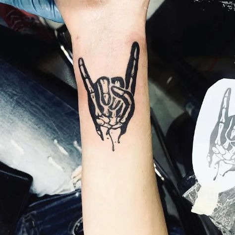 Rock N Roll Skeleton Hand Blackwork Tattoo Idea & Design on Forearm Rock N Roll Skeleton Hand Tattoo Done By Rock N Roll Tattoo Ideas, Rock N Roll Tattoo, Skeleton Hand Tattoo, Finger Tattoo, Skeleton Hand, Idea Design, Abstract Tattoo, Skeleton Hands, Hand Tattoo