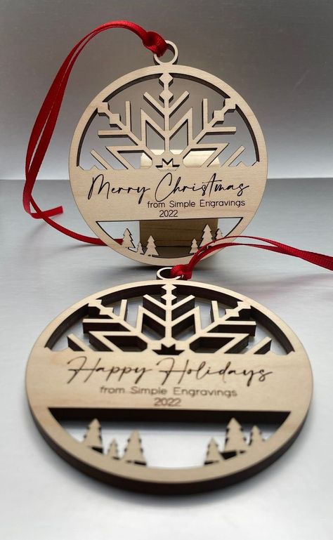 Create stunning engraved wooden ornaments using Cricut technology. Explore laser cut designs that make perfect gifts or additions to your Christmas tree this year! Cricut Wood Christmas Ornaments, Laser Wood Ornaments, Christmas Laser Engraving Ideas, Glowforge Christmas Ornaments, Laser Cut Ornaments Christmas, Christmas Ornaments Laser Cut, Laser Ornaments Christmas, Laser Engraved Christmas Ornaments, Laser Christmas Ornaments