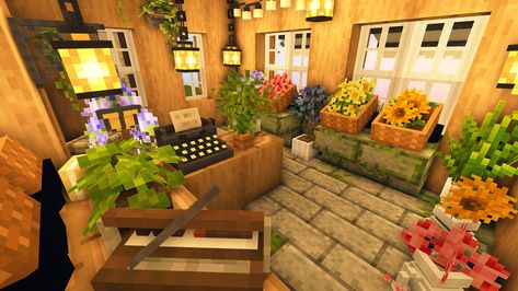 Hey there, fellow Minecrafters! Get ready for the second part of our enchanting journey as we continue crafting an utterly beautiful Cottagecore Village. In this episode, we're adding some floral magic to the mix with an enchanting Cottagecore Flower Shop! (ﾉ◕ヮ◕)ﾉ*:・ﾟ✧ Minecraft Flower Shop, Cottagecore Village, Minecraft Market, Flower Shop Interiors, Interior Design Drawings, Minecraft Projects, Floral Shop, Minecraft Designs, Shop Interior Design