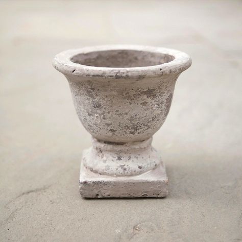 Small Weathered Cement Urn from Terrain | gardenista Weather Stones, Small City Garden, Stone Plant, Iron Planters, Small Flower Pots, Urn Planters, Garden Urns, Small Urns, Garden Essentials