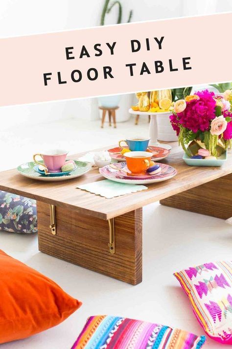 This DIY low floor table is so fun and perfect for floor seating! Make it yourself with our easy step by step tutorial and you can have a new table option for your next gathering. Surround it with comfy pillows and you have a great, boho-inspired option for your dinner parties. You can also take it outdoors for a picnic or backyard barbecue!  #diy #table #lowtable #floorseating #wood #simple #homedecor #diydecor Diy Floor Table, Diy Table Decor, Dekor Diy, Comfy Pillows, Floor Table, Diy Home Decor Ideas, Floor Seating, Diy Flooring, Entertaining Ideas