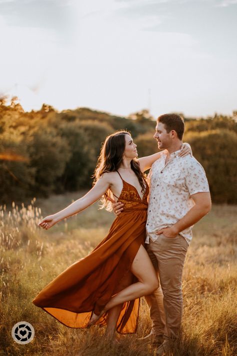 Dreamy outdoor engagement pictures. This silky camel/orange dress is one of my favorite dresses to this day! TTS. Follow my shop @emscapades on the @shop.LTK app to shop this post and get my exclusive app-only content! #liketkit #LTKunder100 #LTKfamily #LTKmens @shop.ltk https://liketk.it/3FpDi Orange Dress Couple Photoshoot, Orange Dress Engagement Photos, Dresses For Engagement Pictures, Outdoor Engagement Pictures, Dress For Engagement, Engagement Picture Outfits, Engagement Pic, 2023 Photo, Outdoor Engagement