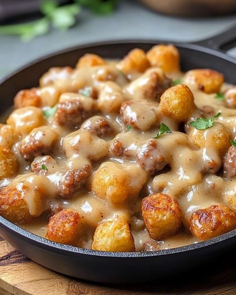 My aunts used to make this, and I thought it was history. Surprise! I found it, and it's even better! Recipes With Brown Gravy, Tater Tot Breakfast, Spicy Sausage, Tater Tots, Sausage Gravy, Breakfast Bowl, Breakfast Recipes Casserole, Hearty Breakfast, Breakfast Brunch Recipes