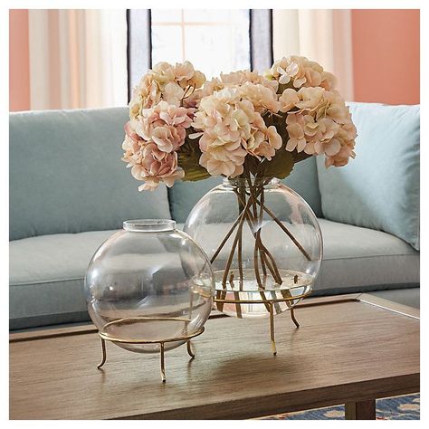 Eleanor Round Clear Glass Globe Vase with Brass Stand | Ballard Designs, Inc. Tall Vase Arrangements, Dining Room Centerpiece, Pedestal Vase, Tall Vase, Air Bnb, Vase Arrangements, Accent Wall Decor, Outdoor Furniture Collections, Outdoor Cushions And Pillows