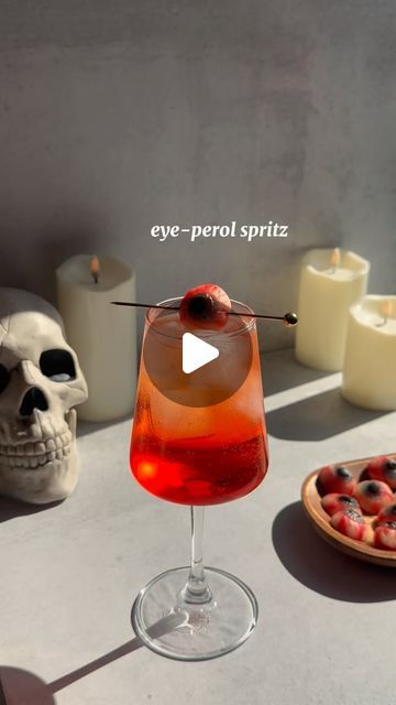 that’s the spirits on Instagram: "Day 2: Eye-Perol Spritz 👁️

There are few things I’m prouder of than the name of this Spooky Spirit. 

Over ice add:
2 oz aperol
.75 oz cranberry syrup
3 oz prosecco 
Top w/ club soda 
Stir
Garnish w/ eyeball gummy 
Enjoy! 

#thatsthespirits #spookyspirits #ttspookyspirits #halloween #halloweencocktails #aperolspritz #eyeperolspritz #spritz #cocktails #drinkrecipes" Spritz Cocktails, Cranberry Syrup, Cocktails To Try, Halloween Cocktails, Club Soda, Holiday Food, Aperol Spritz, Syrup, Holiday Recipes