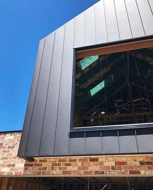 Wall Cladding Melbourne - Architectural Cladding Australia Second Story Extension Australia, Steel Cladding House Exterior, Metricon Facade, Standing Seam Cladding, Iron Cladding, House Exterior Cladding, Architectural Cladding, Steel Houses, Sauna Ideas