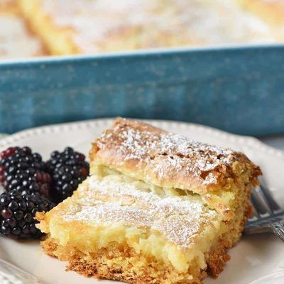 Make a simple and easy St. Louis style gooey butter cake using a cake mix. Ooey gooey recipe for the best dessert you'll ever have! #adventuresofmel #gooeybuttercake #desserts #cakerecipes #easyrecipes #cakemix Easy Cake Mix Desserts, St Louis Gooey Butter Cake, Ooey Gooey Butter Cake Recipe, Easy Butter Cake Recipe, Gooey Butter Cake Recipe, Box Cake Recipes, Ooey Gooey Butter Cake, Butter Cakes, Lemon Cake Easy