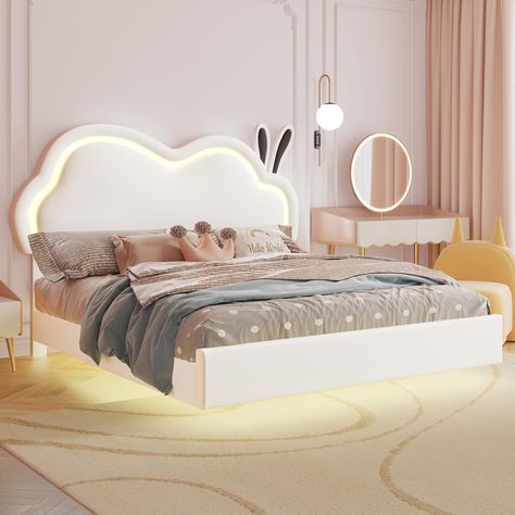 PRICES MAY VARY. LED Adjustable Headboard: Upgrade your bedroom with a chic white bed frame featuring an adjustable headboard, customizable from 45.3" to 47.2" to fit 10-12" mattresses. Soft LED lights around the clound headboard create a cozy atmosphere. Adorable Upholstered Bed: This Princess bed features removable rabbit ears, revealing a charming cloud-shaped headboard. Your full bed frame providing a cozy and restful sleeping space, also a personal playground. Airy Floating Experience: The Headboards For Full Size Beds, Kawaii Bed Frame, Cute Bedframes, Girls Full Bed, Cute Bed Frame, Cloud Bed, Led Headboard, Loft Bed Plans, Floating Bed Frame