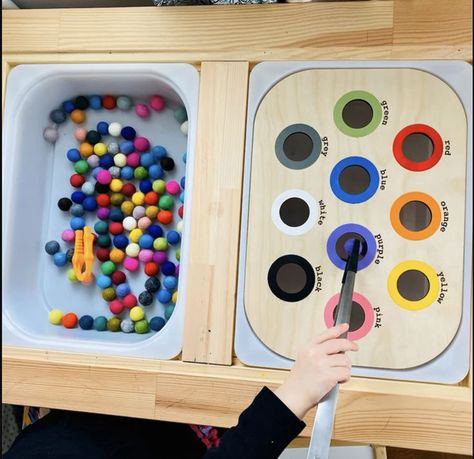 I love this use for pom poms in the IKEA flisat table. We love our Flisat kids table! #sensoryplay #sensorybin #toddlers #flisat #sensoryplay #preschool #toddleractivities   *affiliate links included Ikea Preschool, Easy Flisat Ideas, Ikea Activity Table, Sensory Table Activities Toddlers, Flisat Ikea Table Activities, Ikea Flisat Sensory Table Ideas, Flisat Table Inserts, Ikea Sensory Table, Flisat Table