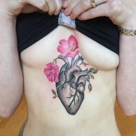 Pretty awesome one. Heart is medical-looking but not so realistic that it's icky. Nice subtle soft flowers. One of my favorites. Realistic Heart Tattoo, Heart Flower Tattoo, Anatomy Tattoo, Anatomical Heart Tattoo, Super Tattoo, Heart Ideas, Sternum Tattoo, Anatomical Heart, Tattoo Work