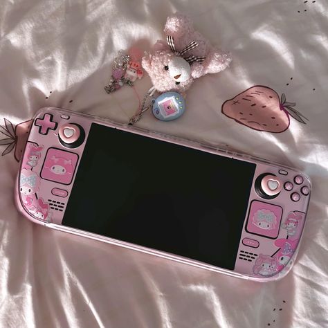 Rog Ally Aesthetic, Steam Deck Oled Aesthetic, Steamdeck Aesthetic, Steam Deck Aesthetic, Pink Console, Gaming Essentials, Hello Kitty Games, Gaming Desk Setup, Kawaii Games