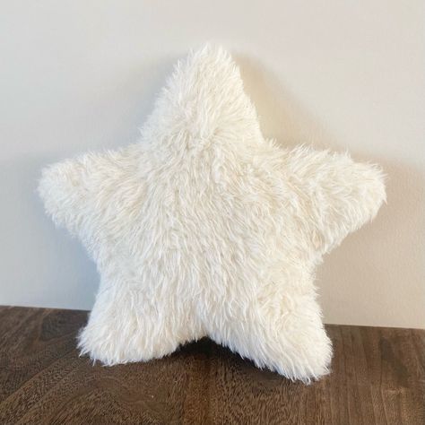 "Introducing our Cozy Star-Shaped Pillow Cushion, a plush and stylish addition to any room. This fluffy star-shaped cushion, crafted with soft faux fur, offers both comfort and a touch of modern decor. Its unique star shape makes it a versatile piece for adding a festive feel during the holidays or as a charming year-round accent. Perfect for snuggling on the couch or as a whimsical touch to a child's bedroom, this pillow is not only a cozy companion but also a delightful decorative item for those who love a minimalist yet playful home aesthetic. Dimensions:   - 14\"x14\" Materials: Gold metallic white faux fur (White star) - 100% polyester Pink Faux fur  -100% polyester" Fluffy Pillows Aesthetic, New Pillows, Aesthetic Cushions, Cute Pillows Aesthetic, Hidy Hole, White Fluffy Pillow, Unique Cushions, Aesthetic Pillows, Playful Home