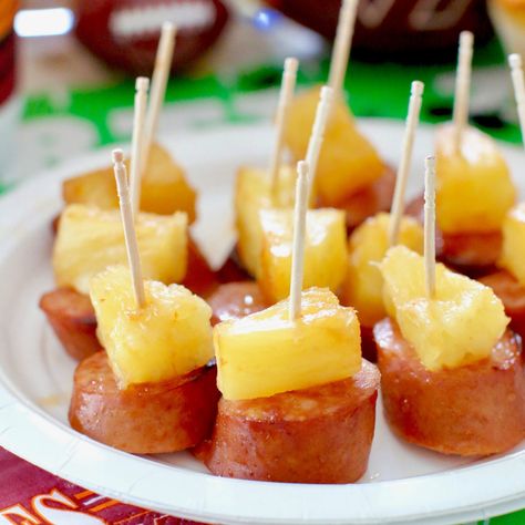 Glazed Kielbasa Bites with pineapple are a fun and simple appetizer or tailgating snack! The glaze makes these a little bit salty and a little bit sweet! Glazed Kielbasa Pineapple Bites, Kielbasa Pineapple, Tropisk Fest, Mozzarella Sticks, Smitten Kitchen, Finger Food Appetizers, Kielbasa, Christmas Party Food, Party Food Appetizers