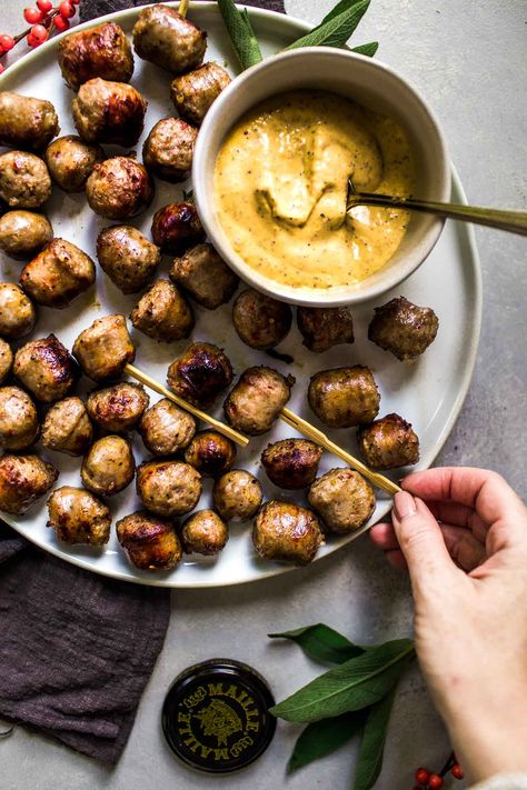 Sausage Bites Cooked in White Wine and Served with Creamy Mustard Dipping Sauce - #ad These Sausage Bites are simmered in white wine and served with a creamy, spicy mustard dipping sauce. They’re a delicious party appetizer that cooks up quickly.