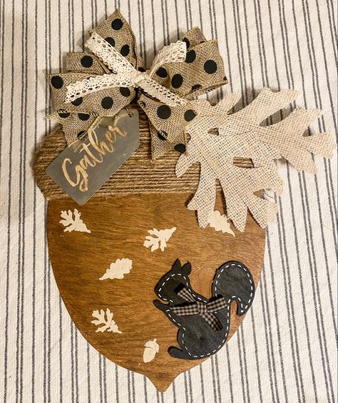 Dollar Tree Acorn Craft, Acorn Door Hanger Wooden, Dollar Tree Acorn, Dollar Tree Wood Acorn Diy, Quilt Repurpose, Fall Dollar Tree Crafts, Fall Squirrel Decor, Dollar Tree Acorn Sign, Dollar Tree Fall Sign Makeover