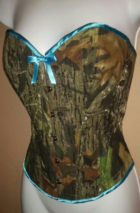 Camo corset, Mossy Oak with bright blue By Tailgunner Apparel Teal Corset, Camo Corset, Green Porcelain Corset, Named Collective Blue Camo, Camo Prom Dresses, Blue Corset With Built-in Bra, Camo Outfits, Mossy Oak, Waist Training