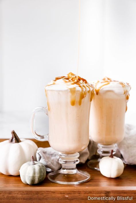 #ad This Pumpkin Spice Milkshake is topped with a homemade pumpkin spice whipped cream and is the perfect early fall dessert! @ToraniFlavor #pumpkinmanyways #torani | Pumpkin milkshake dessert recipe for fall. | Fall dessert for hot weather. | Warm weather fall dessert recipes. | Fall ice cream dessert recipe with pumpkin spice. | Autumn dessert recipe for Thanksgiving. | Fall dessert for parties. | Easy pumpkin dessert recipe. | Pumpkin Spice Milkshake, Fall Ice Cream, Recipe With Pumpkin, Easy Pumpkin Recipes Desserts, Pumpkin Milkshake, Domestically Blissful, Ice Cream Dessert Recipe, Spiced Whipped Cream, Autumn Dessert