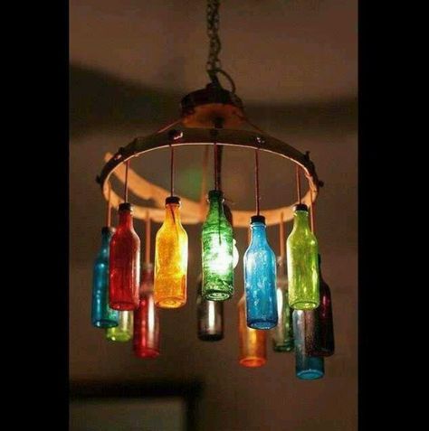 Colored glass bottle chandelier | Colored Glass | Pinterest Gazebo Lighting, Bottle Chandelier, Jar Chandelier, Recycled Bottle, Lighted Wine Bottles, Seni Origami, Bottle Lights, Wine Bottle Crafts, Bottles And Jars