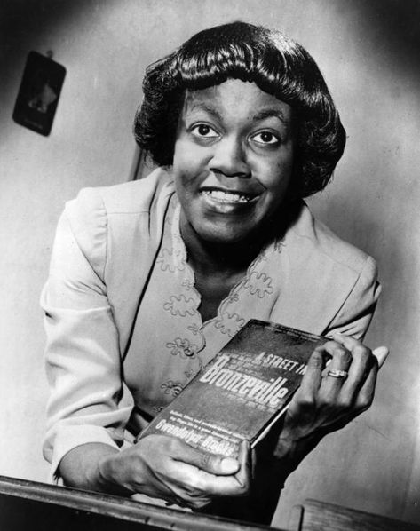 Gwendolyn Brooks poses with her first book of poems, A Street in Bronzeville. Gwendolyn Brooks, African American Writers, Aesthetic Writing, Famous Writers, African American History Facts, Black Writers, Book Of Poems, History People, Black Authors