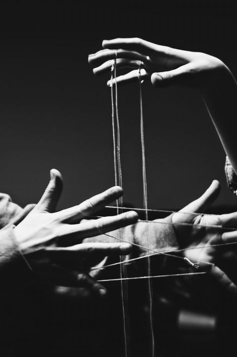 Multiple Hands Photography, Hands Art Photography, Chain Illustration Drawings, Puppet Strings Aesthetic, Hands With Strings, Hand Photography Creative, Hand Holding Puppet Strings, Intertwined Photography, Strings Aesthetic