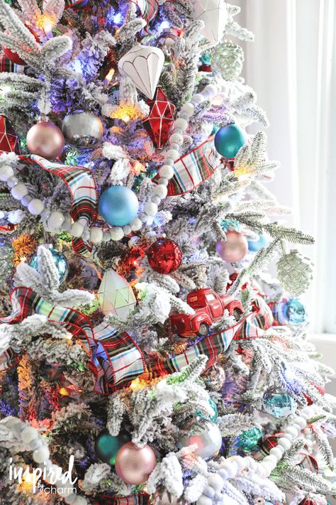 Flocked Christmas Trees Decorated Colorful, Flocked Christmas Trees Decorated Multi Color, Flocked Tree With Colored Lights, Snowflake Theme Christmas Tree, Traditional Christmas Tree Multicolor, Decorated Flocked Christmas Trees, Christmas Tree Colored Lights, Pencil Christmas Tree Ideas, Flocked Tree