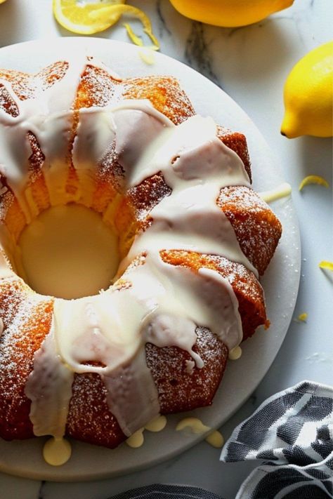 This Ritz Carlton lemon pound cake will bring a taste of luxury right to your table. This Bundt is moist, airy, and bright, perfect for any occasion. Lemon Ricotta Bundt Cake, Ritz Carlton Lemon Pound Cake, Ricotta Bundt Cake, Dense Cake, Whole Orange Cake, Candied Lemon Peel, Lemon Pound Cake Recipe, Sour Cream Pound Cake, Lemon Bundt Cake