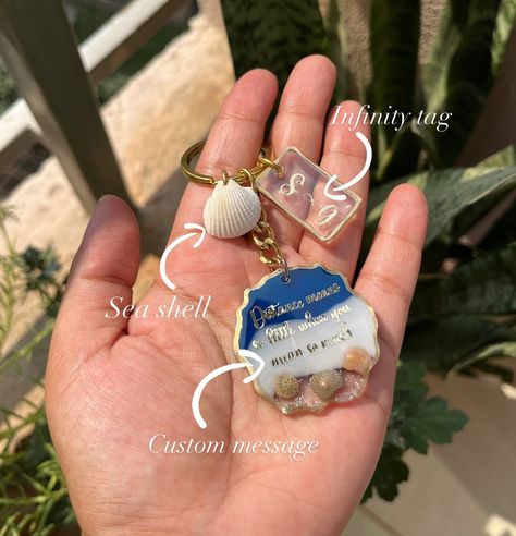 Ocean themed keychain with message and initial tag 🌊🐚 ₹400 + free shipping Ocean keychain Resin keychain ideas Handmade resin art Rose preservation #resin #resinart #handmade #art #resinartist #resinartwork #ástvinur #resincraft #keyrings #roses #resinkeychain #explorepage✨ #ástvinur #artist #flowerkeychains #preservedflowers #ocean #oceanresinart #chandigarhresinartist #resinindianartist Rose Preservation, Resin Keychain Ideas, Ocean Keychain, Keychain Resin, Keychain Ideas, Story Ig, Resin Keychain, Ideas Handmade, Resin Artwork