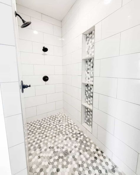 21 White Bathroom Tile Ideas for a Bright and Versatile Sanctuary Subway Tile Shower Niche, Pebble Tile Shower, Large Shower Tile, White Shower Tile, White Subway Tile Shower, Mosaic Shower Tile, Tile Shower Niche, Gray Shower Tile, White Subway Tile Bathroom