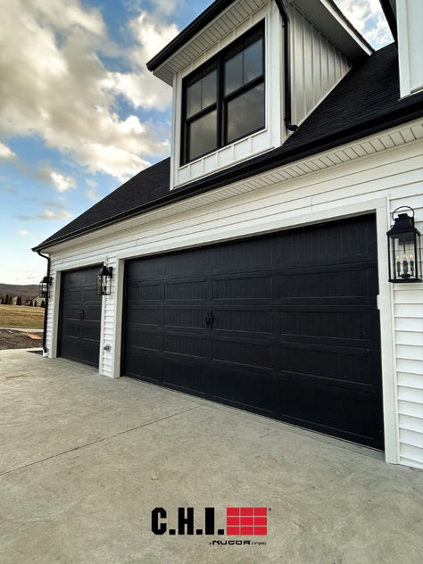 black carriage house garage doors on white modern farmhouse exterior Modern Farmhouse Garage Doors, Black Garage Door, Black Garage Doors, Garage Door House, Carriage Garage Doors, Black Garage, Modern Exteriors, Garage Door Styles, Welcome To The Dark Side