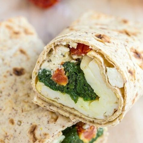 Copycat Starbucks Spinach and Feta Wrap (Freezer Friendly!)- The Big Man's World ® Spinach Feta Wrap, Copycat Breakfast, Feta Wrap, Feta Breakfast, Spinach Wrap, Egg Whites Wrap, Egg Spinach, Breakfast Wrap, Starbucks Wrap