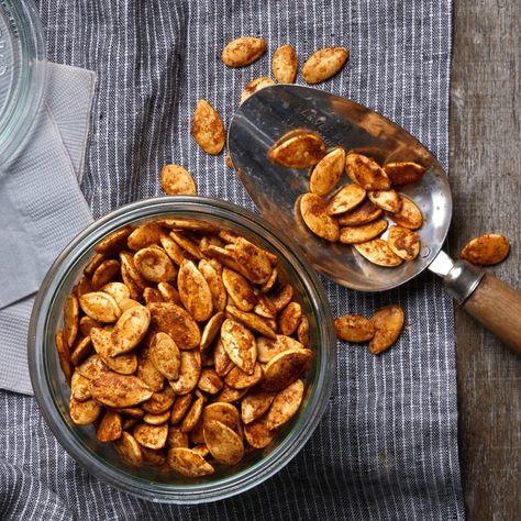 Salty, spicy and garlickly, these roasted pumpkin seeds are the perfect snack for any time of day. Increase the quantity of ground chile if you want 'em extra hot. Roasted Butternut Squash Seeds, Spicy Roasted Pumpkin Seeds, Fresh Pumpkin Recipes, Fall Routine, Spicy Pumpkin Seeds, Pumpkin Seeds Recipe, Thanksgiving Appetizers Easy, Peter Pumpkin, Tomatillo Sauce