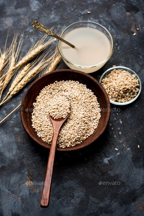 Barley Water by stockimagefactory. Barley water in glass with raw and cooked pearl barley wheat/seeds. selective focus #Sponsored #water, #glass, #raw, #Barley Flour Image, Barley Plant, Water In Glass, Wheat Seeds, Barley Seeds, Barley Water, Follicular Phase, Cycle Syncing, Pearl Barley