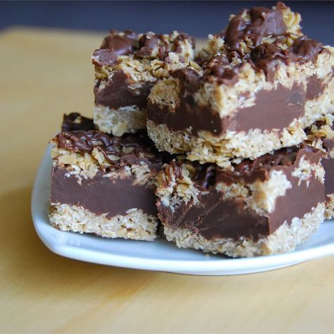 No Bake Chocolate Oat Bars Recipe | Allrecipes No Bake Chocolate Oat Bars, Homemade Cookie Bars, Oat Bars Recipe, Chocolate Oat Bars, Blueberry Crumb Bars, Oat Bar Recipes, Oatmeal Cookie Bars, No Bake Oatmeal Bars, Cranberry Dessert