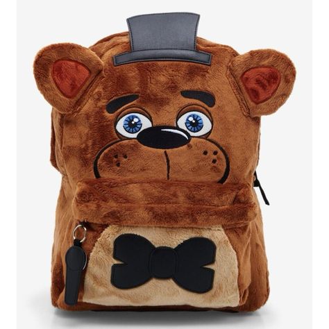 Five Nights At Freddy's Figural Fuzzy Freddy Backpack Survive The Night At The Pizzaplex With Your Essentials Packed Into This Five Nights At Freddy's Backpack! It's Fuzzy With A Figural Top Hat And Ears, Plus Freddy's Eyes Glow-In-The-Dark. Includes A Microphone Front Zipper Pull, Padded Back And Straps, Side Pockets And An Interior Laptop Pocket. * 12" X 6" X 17" * Polyester; Nylon * Side Pockets * Front Zipper Charm * Glow-In-The-Dark Detail * Laptop Pocket * Imported Fnaf Backpack, Funny Hats, Pretty Ppl, Cute School Supplies, Zipper Charms, Backpack Brands, Gamer Gifts, Laptop Pocket, Cute Bags