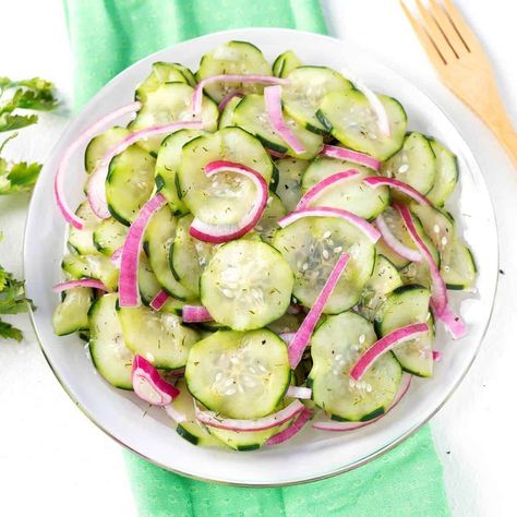 Classic Cucumber Salad is tart and sweet, with crisp marinated cucumber slices and red onion. This is an easy salad to make that goes well with beef, pork, and chicken. A very delicious cucumber salad recipe. retrorecipebox.com #cucumber #salad #easyrecipe #lunch Sour Cucumber Salad, Armenian Cucumber, Dill Salad Recipe, Cucumber Recipes Healthy, Creamy Cucumber Tomato Salad, Easy Salads To Make, Dill Cucumber, Easy Cucumber Salad, Spicy Cucumber Salad