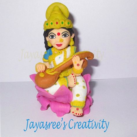 Lord Saraswathi from Jayasree's creativity Facebook page.  Procedure for making cold porcelain clay  Take 1cup cornflour, 1cup fevicol, 1teaspoon oil(u can use any oil..i prefer baby oil), 1 or 2 teaspoon vinegar or lemonjuice and finaly add one teaspoon of glycerin mix it well in a bowl and heat it slowly.... with continuous stirring with medium heat the dough will come out from the vessel .... take the dough from the pan transfer it on a clear and smooth surface coated with any cold cream(u ca Cold Porcelain Clay, Clay Modelling, Pot Painting, Kids Clay, Ganesh Ji, Clay Crafts Air Dry, Cold Cream, Clay Craft, Goddess Art