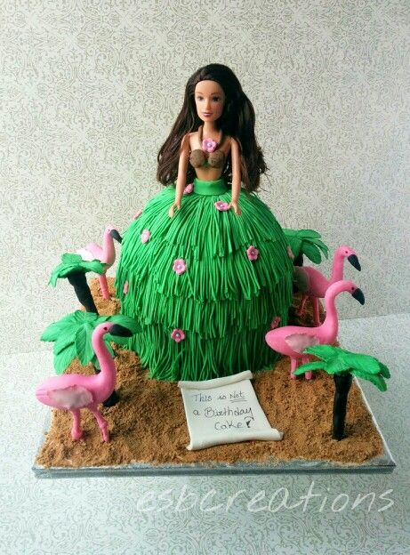 Hawaiian Barbie doll cake with Flamingos and palm trees...with an inside joke message Hawaiian Barbie Cake, Hawaiian Barbie, Hawaii Birthday Party, Hawaii Birthday, Luau Cake, Barbie Doll Birthday Cake, Barbie Doll Cake, Lily Cake, Doll Birthday Cake