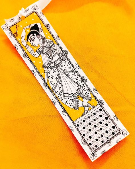 A Dancer's Elegance Bookmark BOOKMARK JULY Pt. 9 . . . 🌼✨ Dive into the beauty of traditional art with our "Dancing Elegance Bookmark"! This captivating piece of Madhubani art showcases a graceful dancer in motion, bringing intricate details and cultural charm to your reading journey. Handcrafted with love on premium paper using Japanese calligraphy pens, it’s the perfect blend of elegance and tradition. Swipe left to see the close-ups and add a touch of heritage to your collection. 📚❤️ #Mad... Madhubani Bookmarks, Bookmark Business, Kalamkari Art, Book Art Projects, Bookmark Ideas, Easy Doodle, Creative Bookmarks, Music Illustration, Madhubani Art