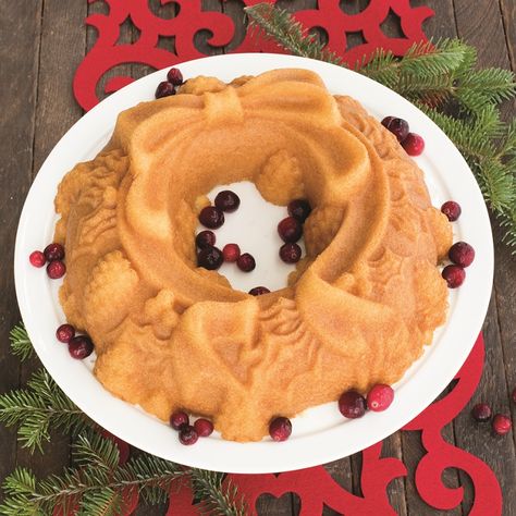 Create this incredible Rum Wreath Cake for your next holiday party! This festive dessert recipe will become a new crowd favorite and no extra decorations are needed, due to the beautiful intricate design of our Holiday Wreath Bundt Pan. Wreath Bundt Cake, Festive Dessert Recipes, Wreath Cake, Buttered Rum, Cake Rolls, Mini Bundt, Bundt Cake Pan, Festive Desserts, Pound Cakes