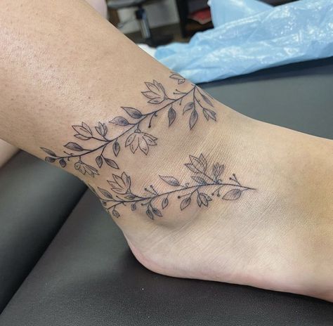 Floral ankle tattoo wrap around dainty Vine Anklet Tattoo, Ivy Ankle Tattoo, Foot Wrap Tattoo, Floral Wrap Around Tattoo Leg, Tattoo Wrapped Around Ankle, Sunflower Ankle Tattoo Wrap Around, Flower Ankle Bracelet Tattoo, Floral Anklet Tattoo, Ankle Tattoo Wrap Around