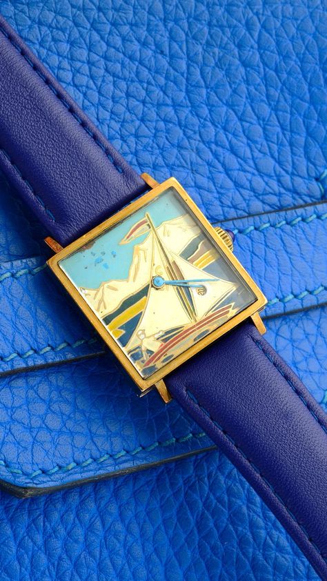 A yellow gold 'Sailing dial' wrist watch. Cool Watches Unique, Fun Watches, Vintage Rolex Watches, Funky Watches, Vintage Gold Watch, Unique Watches, Vintage Timepiece, Retro Watches, Vintage Watches For Men