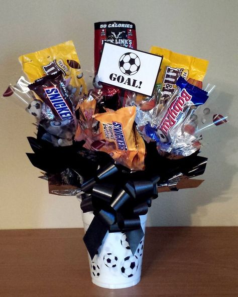 Soccer candy bouquet in a cup for the soccer coach Coach Soccer, Gift Card Bouquet, Soccer Coach Gifts, Candy Arrangements, Boyfriend Gift Basket, Senior Night Gifts, Soccer Boyfriend, Soccer Coach, Senior Gifts