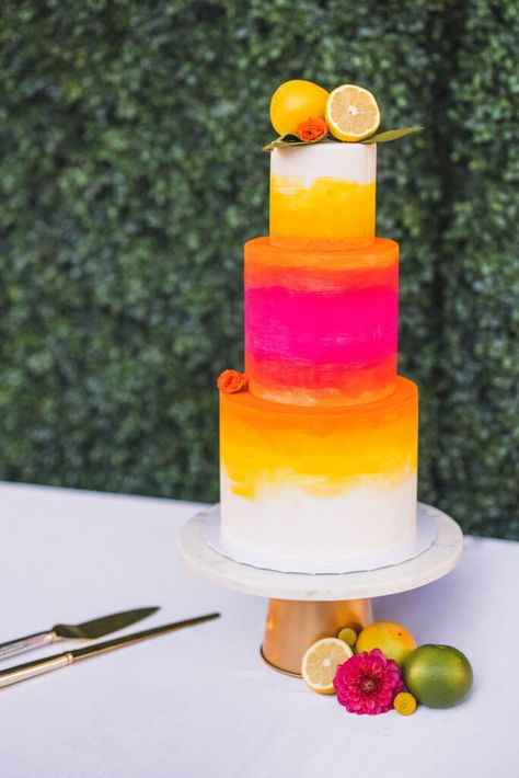 Citrus inspired wedding decor with gorgeous ombre wedding cake. #weddingdecor #weddingsinpo #citrus #brightcolors #weddingcolors #weddingcake #ombre #ombreweddingcake #ombrecake Pride Wedding Cake, Sunset Wedding Cake, Coachella Cake, Ombre Wedding Decor, Hombre Cake, Bright Colored Wedding, Sunset Cake, Colorful Wedding Cake, Tropical Birthday Cake