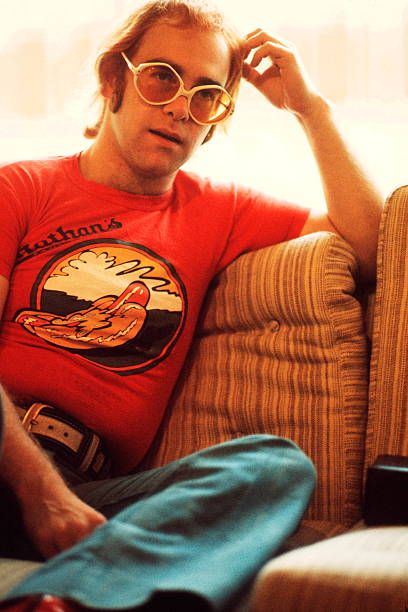 Elton John 1974 Pictures and Photos - Getty Images Elton John Aesthetic, John Aesthetic, 70s California, Throwback Music, Paul Rodgers, Disco Birthday, California Aesthetic, Emerson Lake & Palmer, 70s Orange