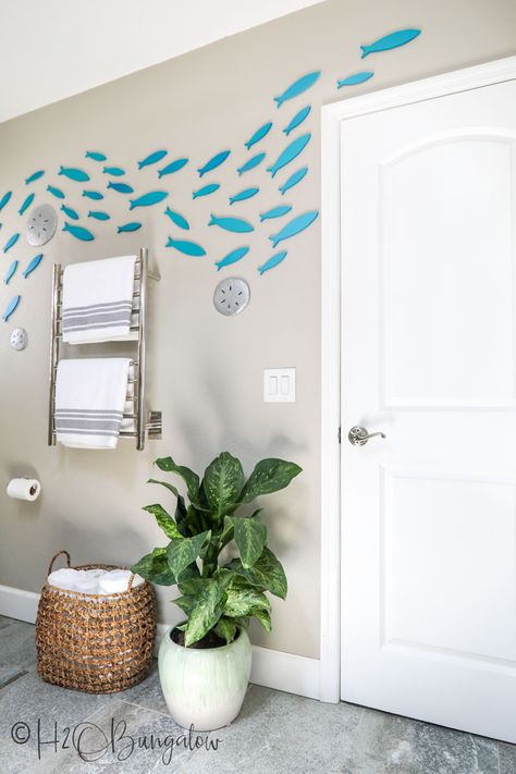 How to make a school of fish wall decor with wooden cutout fish and a free set of free fish templates in different sizes with tips to place them on the wall #fishdecor #coastaldecor #beachstyle #H2OBungalow Fish Wall Mural, Fish Mural, Diy Bathroom Ideas, Big Blank Wall, Dark Blue Paint, Swimming Fish, Paper Fish, Fish Template, Wal Art