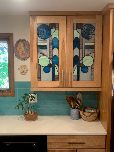 Size: 13 1/2 wide x 34 1/2 tall. In this Stained Glass Cabinets Insert you can see a simple but elegant design that mixes straight and curved lines with some circles. For this work we mix clear glass of different textures and colors. This design can be made in any colors or textures that complement your decor and provide as little or as much privacy as you require. Note: Price listed is for one piece only. If you want more than one piece, please contact us for a quote. -------------------------- Stained Glass Cabinet Doors, Stained Glass Kitchen Cabinets, Stained Glass Cabinet, Stained Glass Cabinets, Cabinet Inserts, Stained Glass Circles, Etching Diy, Glass Kitchen Cabinet Doors, Glass Kitchen Cabinets