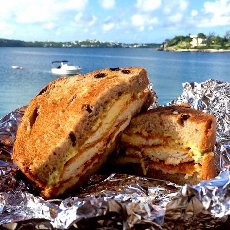 Seaside with a fish sandwich with a sandwich from the #SeasideGrill. A little #flashbackfriday post for all of our Bermuda people who will be "making the run" this lunch time for one of these golden crusted tender joys (with hot sauce of course). It's the weekend people.  Have a great one!!! #biteofbermuda #bermuda #bermudafood #wearebda #wearebermuda #lovemybermuda #sharemybermuda #forkyeah #eeeeeats #fishsandwich (you can see this and a bunch more on our Pinterest board...have a look (P.S. don't forget to tag your food pics for a chance to be featured here) Wahoo Fish, Fish Sandwich Recipes, Travel By Plane, Bermuda Travel, Fish Sandwich, Global Cuisine, By Plane, Sandwich Recipe, Burgers Sandwiches