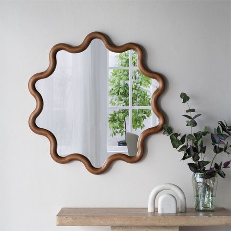 Introducing "The Pop Home" Wall Mirror, a stunning addition to your home decor that combines functionality with artistic intrigue. This decorative mirror features a unique wave-like frame crafted from high-quality pine wood and eco-friendly MDF, finished in a rich dark brown hue. Its captivating design is sure to capture the attention of your guests and become a focal point in any room. Not only does this mirror provide a crystal-clear reflection, but it also offers a practical edge by reflectin Round Mirror Wood, Round Wood Mirror, Pine Wood Walls, Mirror Crystal, Transitional Decor Style, How To Clean Crystals, Circle Mirror, Mirror Artwork, Wood Wall Mirror